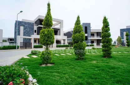 Apartment - 2 Bedrooms - 2 Bathrooms for sale in Karma Residence - 16th District - Sheikh Zayed City - Giza