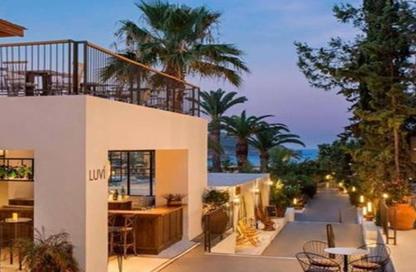 Chalet - 4 Bedrooms - 3 Bathrooms for sale in Ogami - Ras Al Hekma - North Coast