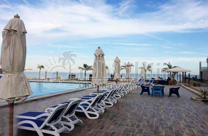 Chalet - 2 Bedrooms - 2 Bathrooms for sale in Aroma Beach - Al Ain Al Sokhna - Suez