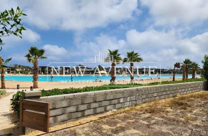Villa - 4 Bedrooms - 4 Bathrooms for sale in Swan Lake North Coast - Qesm Ad Dabaah - North Coast