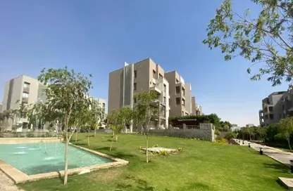 Apartment - 2 Bedrooms - 2 Bathrooms for sale in Palm Hills Village Gate - South Investors Area - New Cairo City - Cairo