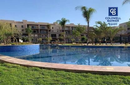 Apartment - 2 Bedrooms - 2 Bathrooms for sale in October Plaza - 6 October Compounds - 6 October City - Giza