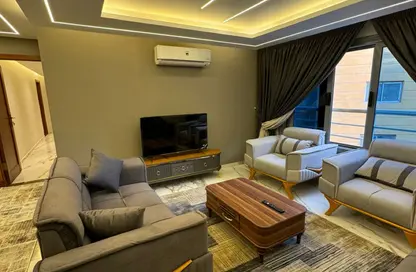 Apartment - 3 Bedrooms - 3 Bathrooms for rent in Rashdan St. - Dokki - Giza