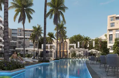 Apartment - 2 Bedrooms - 2 Bathrooms for sale in Aqmar - Al Wahat Road - 6 October City - Giza