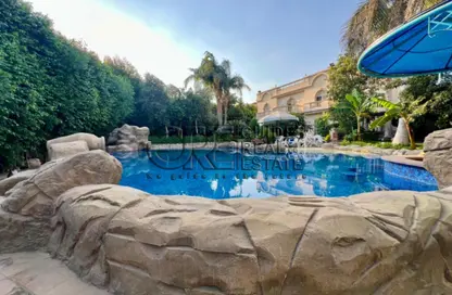 Villa - 5 Bedrooms - 7 Bathrooms for sale in Rawda - Al Wahat Road - 6 October City - Giza