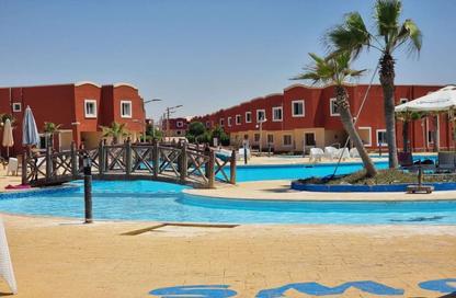 Chalet - 2 Bedrooms - 2 Bathrooms for sale in Bungalows North Coast - Bungalows - Markaz Al Hamam - North Coast