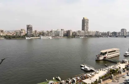 Apartment - 4 Bedrooms - 2 Bathrooms for sale in Nile St. - Dokki - Giza