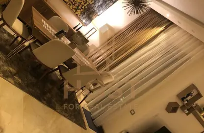 Apartment - 2 Bedrooms - 2 Bathrooms for sale in Palm Hills Village Gate - South Investors Area - New Cairo City - Cairo