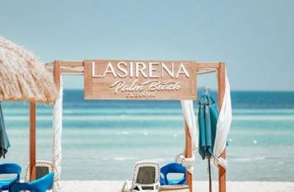 Chalet - 2 Bedrooms - 2 Bathrooms for sale in Lasirena Palm Beach - Al Ain Al Sokhna - Suez