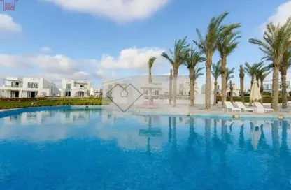 Chalet - 2 Bedrooms - 2 Bathrooms for sale in Hacienda Waters - Qesm Ad Dabaah - North Coast