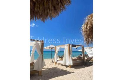 Chalet - 2 Bedrooms - 2 Bathrooms for sale in Hacienda Waters - Qesm Ad Dabaah - North Coast