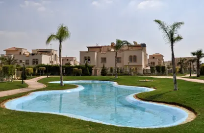 Villa - 4 Bedrooms - 4 Bathrooms for sale in Greens - 6th District - Sheikh Zayed City - Giza