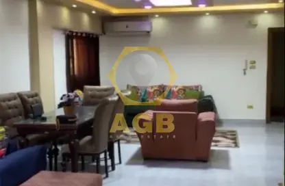 Apartment - 2 Bedrooms - 2 Bathrooms for sale in Rashdan St. - Dokki - Giza