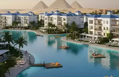 Twin House - 4 Bedrooms - 4 Bathrooms for sale in Vye Sodic - New Zayed City - Sheikh Zayed City - Giza