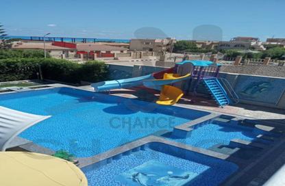 Villa - 4 Bedrooms - 3 Bathrooms for sale in Sidi Kerir - Qesm Borg El Arab - North Coast