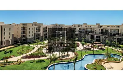 Apartment - 2 Bedrooms - 3 Bathrooms for sale in October Plaza - 6 October Compounds - 6 October City - Giza