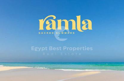 Chalet - 2 Bedrooms - 2 Bathrooms for sale in Ramla Lakeside - Qesm Ad Dabaah - North Coast