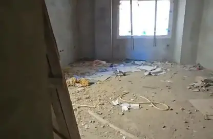 Apartment - 2 Bedrooms - 2 Bathrooms for sale in Mohamed Naguib Axis - Abou El Houl - New Cairo City - Cairo