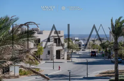 Villa - 4 Bedrooms - 5 Bathrooms for sale in Makadi Orascom Resort - Makadi - Hurghada - Red Sea