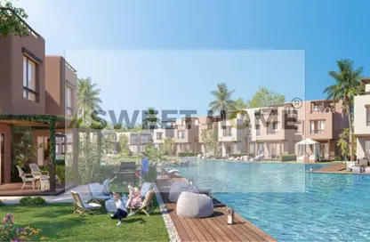 Chalet - 2 Bedrooms - 3 Bathrooms for sale in Hacienda Waters - Qesm Ad Dabaah - North Coast