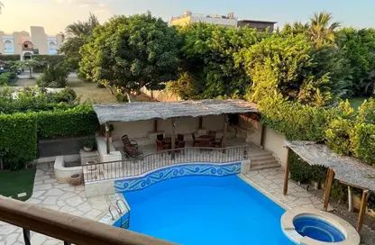 Villa - 6 Bedrooms - 6 Bathrooms for sale in Mena Garden City - Al Motamayez District - 6 October City - Giza