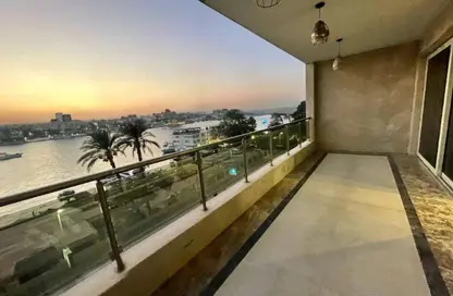 Apartment - 4 Bedrooms - 4 Bathrooms for sale in Nile St. - Dokki - Giza