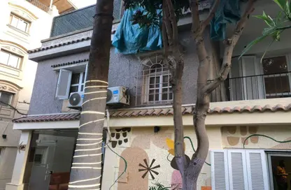 Villa - 4 Bedrooms - 5 Bathrooms for sale in Nasr St. - Hay El Maadi - Cairo