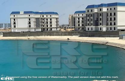 Chalet - 2 Bedrooms - 2 Bathrooms for sale in Latin District - New Alamein City - Al Alamein - North Coast
