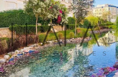Apartment - 2 Bedrooms - 2 Bathrooms for sale in Garden Lakes - 6 October Compounds - 6 October City - Giza