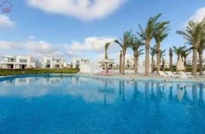 Chalet - 2 Bedrooms - 2 Bathrooms for sale in Hacienda Waters - Qesm Ad Dabaah - North Coast
