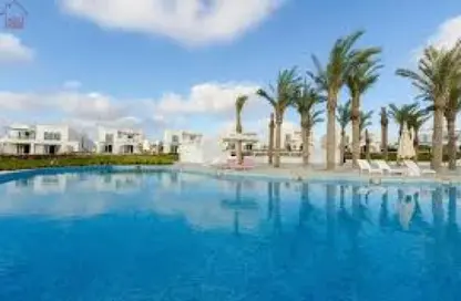Chalet - 2 Bedrooms - 2 Bathrooms for sale in Hacienda Waters - Qesm Ad Dabaah - North Coast