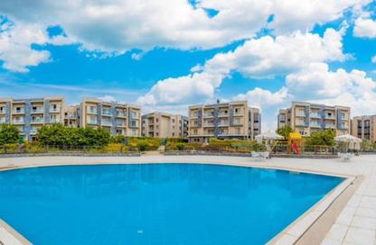 Apartment - 2 Bedrooms - 2 Bathrooms for sale in Galleria Moon Valley - South Investors Area - New Cairo City - Cairo