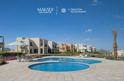 Chalet - 2 Bedrooms - 3 Bathrooms for sale in Makadi Orascom Resort - Makadi - Hurghada - Red Sea