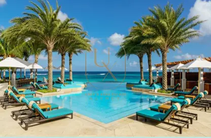 Chalet - 2 Bedrooms - 3 Bathrooms for sale in Hacienda Waters - Qesm Ad Dabaah - North Coast