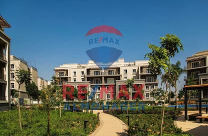 Apartment - 2 Bedrooms - 3 Bathrooms for sale in October Plaza - 6 October Compounds - 6 October City - Giza