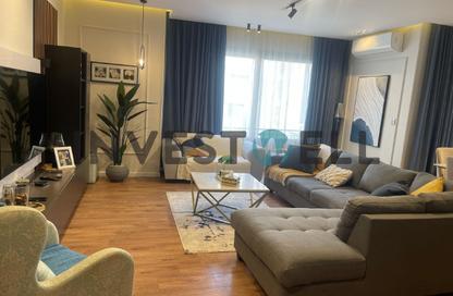 Apartment - 2 Bedrooms - 2 Bathrooms for sale in Palm Hills Village Gate - South Investors Area - New Cairo City - Cairo