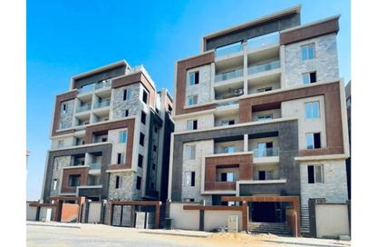 Apartment - 4 Bedrooms - 2 Bathrooms for sale in Ard Gameyet Al Mostasmereen - Hadayek October - 6 October City - Giza