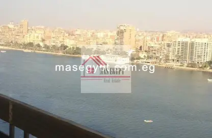 Apartment - 4 Bedrooms - 3 Bathrooms for rent in Nile St. - Dokki - Giza