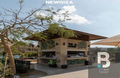 Apartment - 2 Bedrooms - 2 Bathrooms for sale in New Giza - Cairo Alexandria Desert Road - 6 October City - Giza