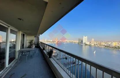 شقة - 4 غرف نوم - 5 حمامات للايجار في شارع النيل - الدقي - الجيزة