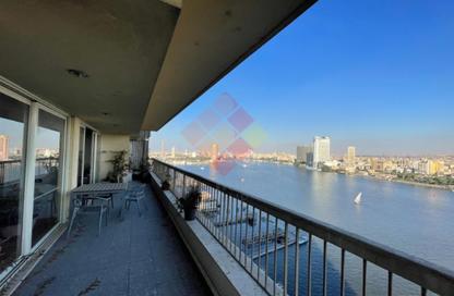 Apartment - 4 Bedrooms - 6 Bathrooms for rent in Nile St. - Dokki - Giza