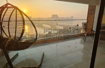 Apartment - 4 Bedrooms - 3 Bathrooms for rent in Nile St. - Dokki - Giza