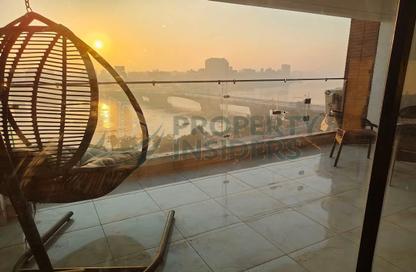 Apartment - 4 Bedrooms - 3 Bathrooms for rent in Nile St. - Dokki - Giza