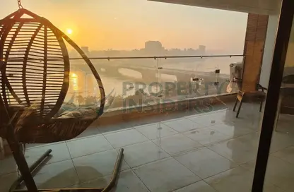 Apartment - 4 Bedrooms - 3 Bathrooms for rent in Nile St. - Dokki - Giza