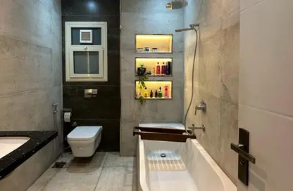 Apartment - 2 Bedrooms - 2 Bathrooms for sale in Dream Land - Al Wahat Road - 6 October City - Giza