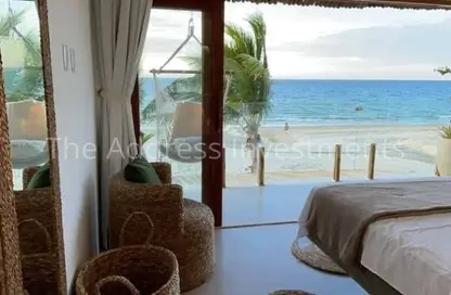Chalet - 2 Bedrooms - 2 Bathrooms for sale in Hacienda Waters - Qesm Ad Dabaah - North Coast