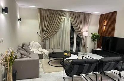 Apartment - 2 Bedrooms - 2 Bathrooms for sale in October Plaza - 6 October Compounds - 6 October City - Giza