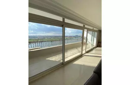 Apartment - 3 Bedrooms - 3 Bathrooms for sale in Nile St. - Dokki - Giza