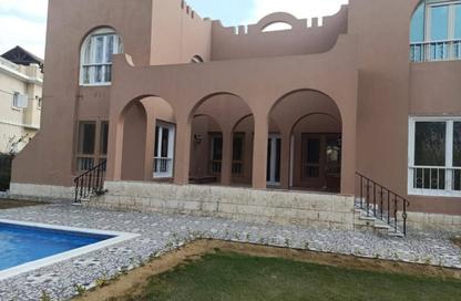 Villa - 6 Bedrooms - 6 Bathrooms for sale in Mena Garden City - Al Motamayez District - 6 October City - Giza