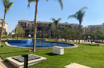 Apartment - 2 Bedrooms - 2 Bathrooms for sale in October Plaza - 6 October Compounds - 6 October City - Giza